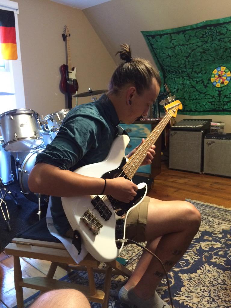 Recording bass and guitar. We still miss our respective hers.