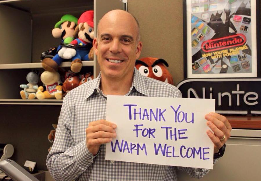 TomMcArthur's tweet photo. Loving the subtle trolling in this pic of Nintendo's VP of Sales, Doug Bowser (Once you see it, etc..) http://t.co/k5eOAB2p2g