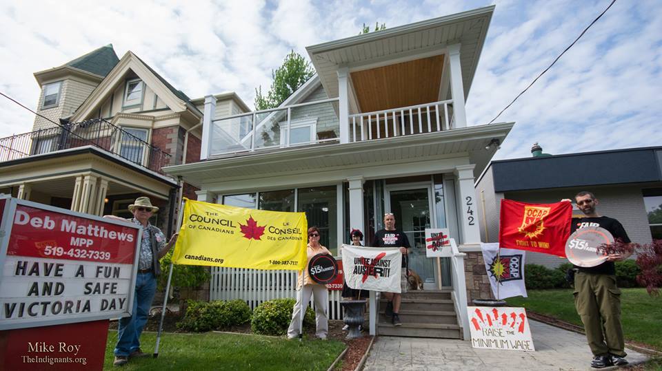 OCAPtoronto's tweet photo. #LondonOntario #RaisetheRates action targets #DebMatthews, the #Liberal Govt's Minister of #Austerity #onpoli http://t.co/RWLwVBzoCu