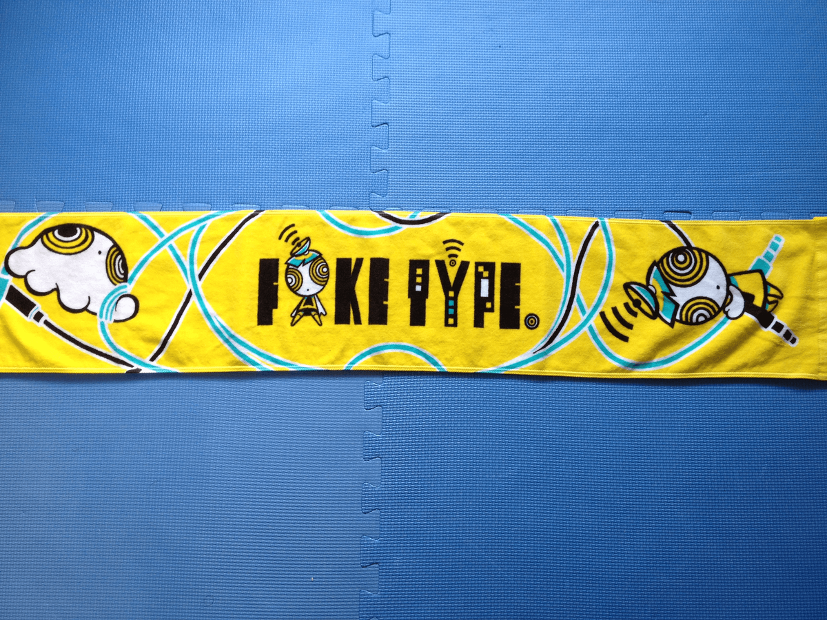 FAKETYPE　タオル　ライブグッズ FAKE TYPE.グッズ情報 Tシャツ、マフラータオル、缶バッジ、iPhone6