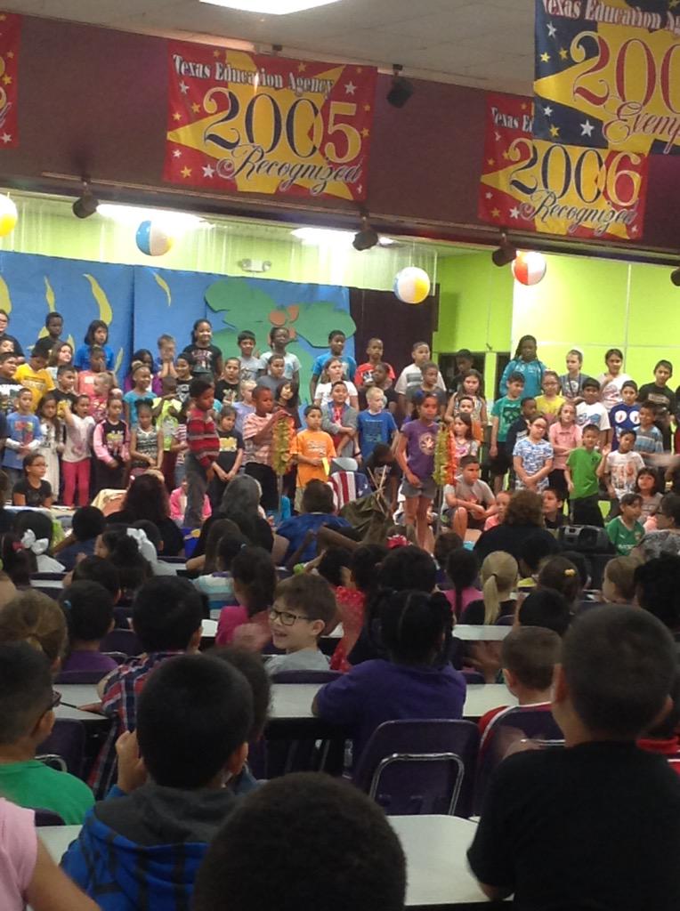 Enjoying the 3rd grade end of year program.
