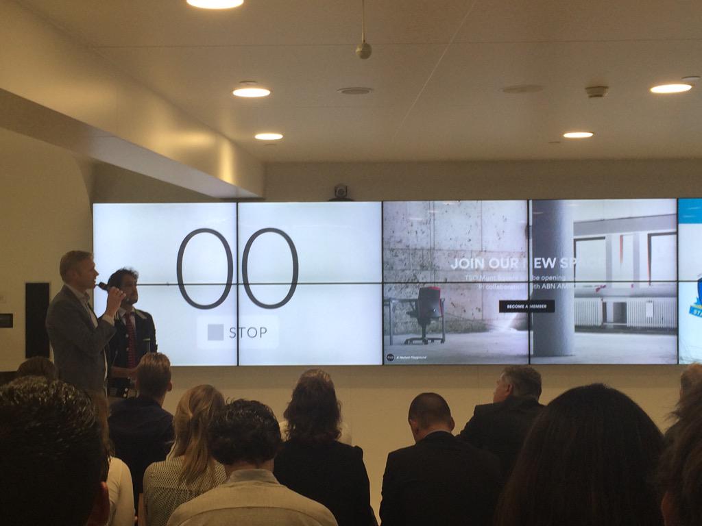 HollandFinTech's tweet photo. .@thestartuporgy and @ABNAMRO talking their collaboration in a new co-working space"TSO Munt Square" #StartupFriday http://t.co/M9Dcf1yq3M