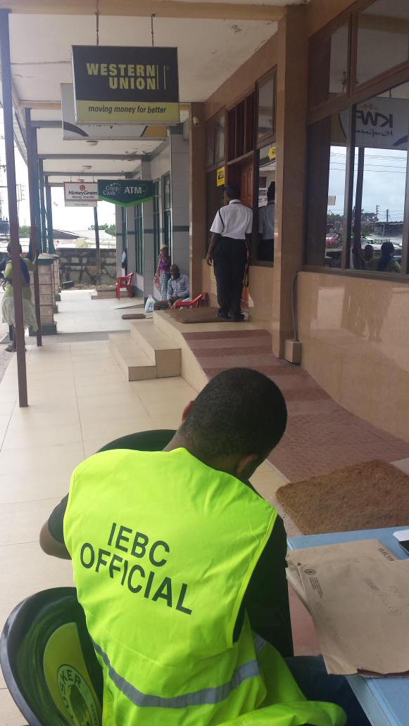 iebclik005's tweet photo. Our mobile Outreach team pitched outside banks and businesses to educate voters and enroll new voters in Timbwani http://t.co/lwCcVcWTM5
