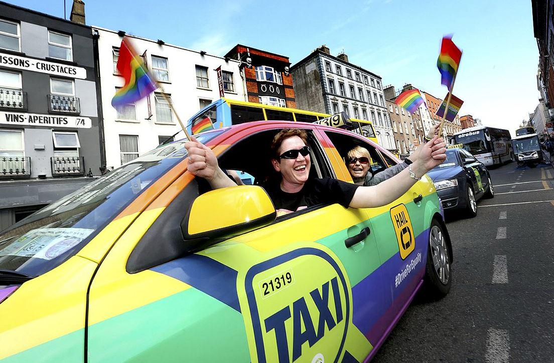 Independent_ie's tweet photo. Celebrating the #MarRef in Dublin city centre. Photo: Gerry Mooney http://t.co/Sj5TeAhqF7