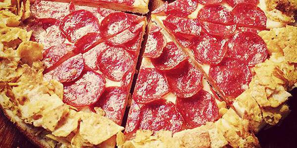 people's tweet photo. Can we interest you in a slice of Doritos pizza? http://t.co/8sJHd5oezK http://t.co/rQAjCF6YDF