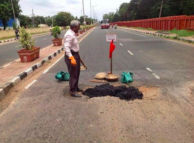 audacious_da's tweet photo. Sri. Gangadhara Tilak Katnam, the 67 yr old man who clears potholes on one single call @hydpolice @WeAreHyderabad http://t.co/rR57M8FcMD