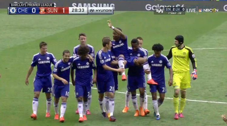 soccergods's tweet photo. Drogba is substituted in the first half. Chelsea players carry him off the field to a standing ovation. Amazing. http://t.co/UGMkCXstHd