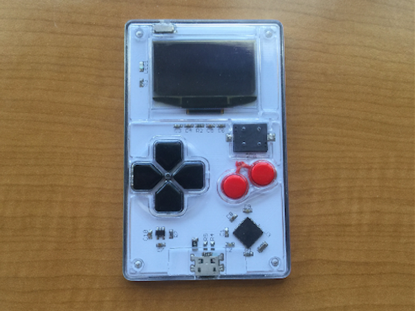 This palm-sized device lets you play classic 8-bit games as you sit in holiday traffic: bit.ly/1JC7pux