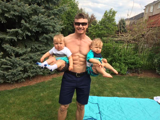 BruceKrahn's tweet photo. What's with this #dadbod trend? If I can do it at 46 with two 1 year olds then there is no excuse#troublespotfatloss http://t.co/ZrYfkvstIR