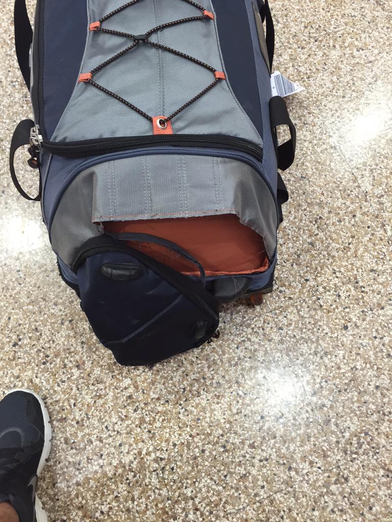 jonnygrover's tweet photo. @SouthwestAir Bags fly for free, but no guarantee it will arrive in one piece. Southwest claims no fault. #SLC http://t.co/TsIoiNiy1D