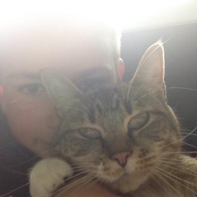 I'm cuddling with my cat and she likes it JK