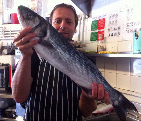Ooh look at what Ian's mate brought in. Line-caught Gower sea bass, the real McCoy!
