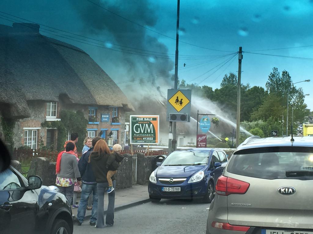 HalloranBarry's tweet photo. Part of Adare's heritage gone up in flames . Hope nobody hurt &amp; they get it under control http://t.co/T6QWj0uAcX