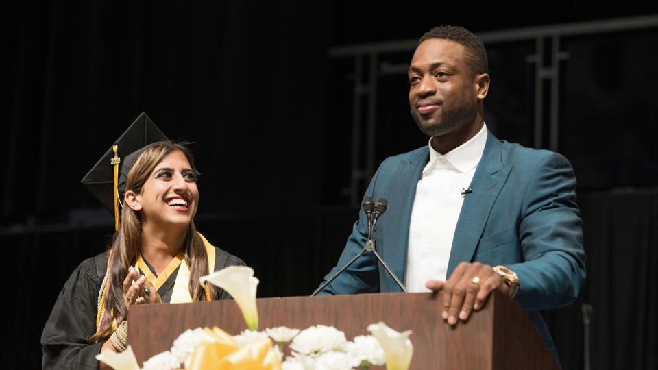 SInow's tweet photo. Good guy Dwyane Wade surprises South Florida high schoolers at graduation http://t.co/8Lv09MZBsI #WadeToWestern http://t.co/IKSJKtdCda