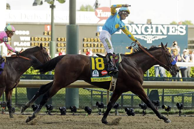 TSN_Sports's tweet photo. American Pharoah wins the Belmont Stakes, becoming the 12th Triple Crown winner &amp; the first in 37 years http://t.co/DRDrk1OD70