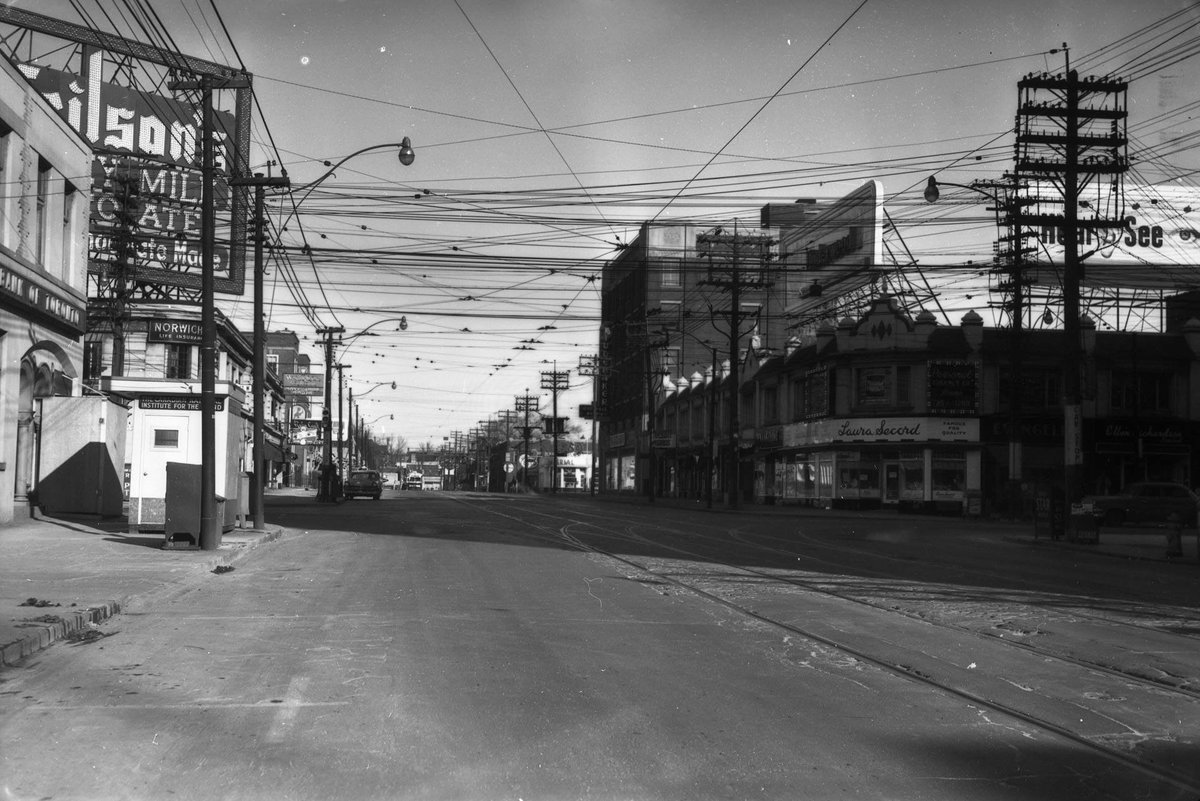 SpiritYorkville's tweet photo. Bay Street, looking North from South of Bloor Street West right before Valentines Day on February 13, 1955. http://t.co/ubd3V85FQl