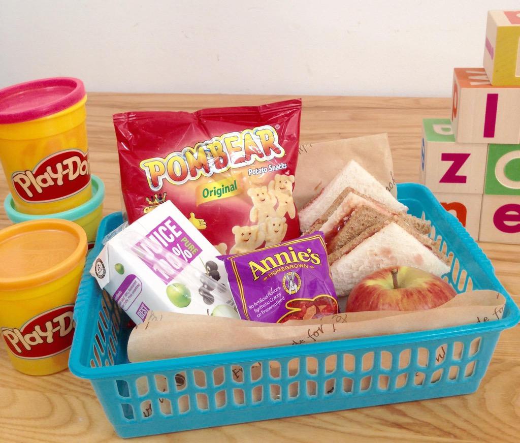 New! Kids' lunchbox. Choice of sandwich, 100% juice box, Pom Bears, organic fruit snacks, and an apple. £4.95 #summer