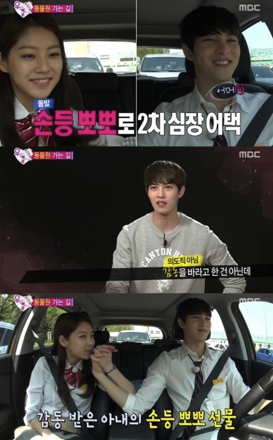 CNBStorm's tweet photo. [News] Gong Seungyeon gives Lee Jonghyun #이종현 a sweet kiss on the hand on "We Got Married" http://t.co/UpvefNY9s2 http://t.co/oXMKW4UPjc