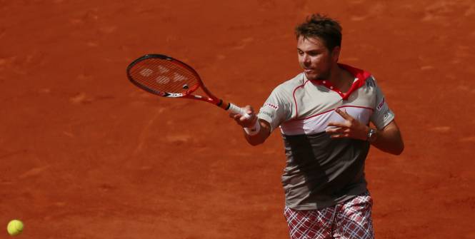 lequipe's tweet photo. Roland-Garros : Stan Wawrinka s'impose face à Novak Djokovic http://t.co/GPMIk11xCl #RG15 http://t.co/1rKld1jSZs