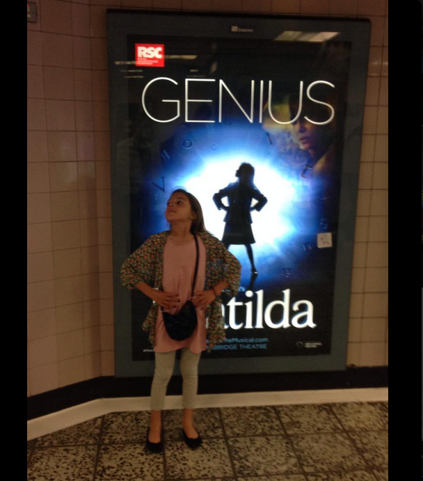 MatildaMusical's tweet photo. We're loving these poses in front of our new GENIUS posters! Send us your #MatildaPose if you spot one. http://t.co/O9HafSHEOz