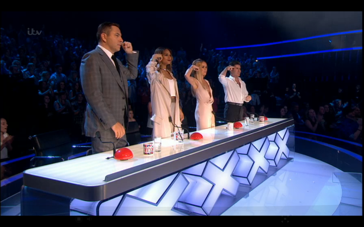ITV's tweet photo. Wow I'm exhausted just watching them! #IMDLegion certainly are legion. 
Salutes all round.
#BGTlive #BGT http://t.co/micOlJT1I6