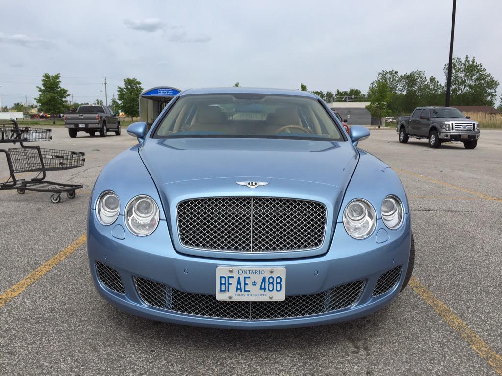 CarWindsor's tweet photo. Bentley Flying Spur spotted at Walmart http://t.co/KIZIILfrFR