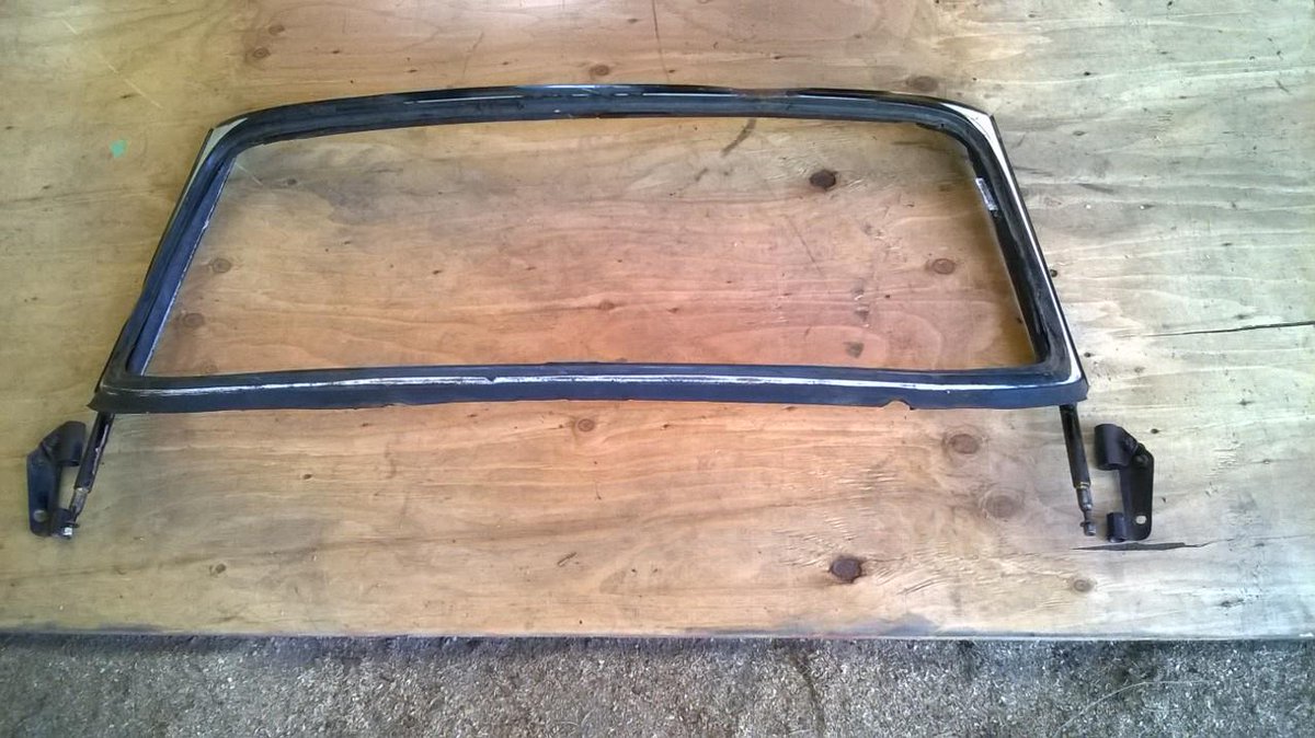 irunningtips's tweet image. Success. Removed windscreen frame after slicing goop under the seal and taking a propane torch to the post brackets.
