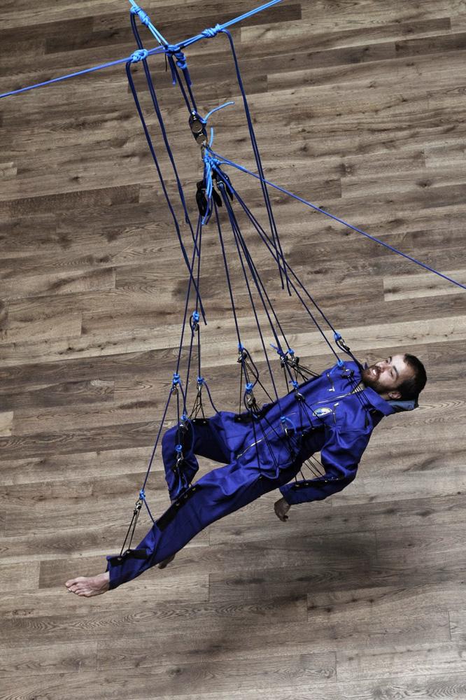 FastCoDesign's tweet photo. Architecture students build a suit that simulates sleeping in zero gravity: http://t.co/SwJ8rGjrtD by @sophcw http://t.co/7Tffde2nXi