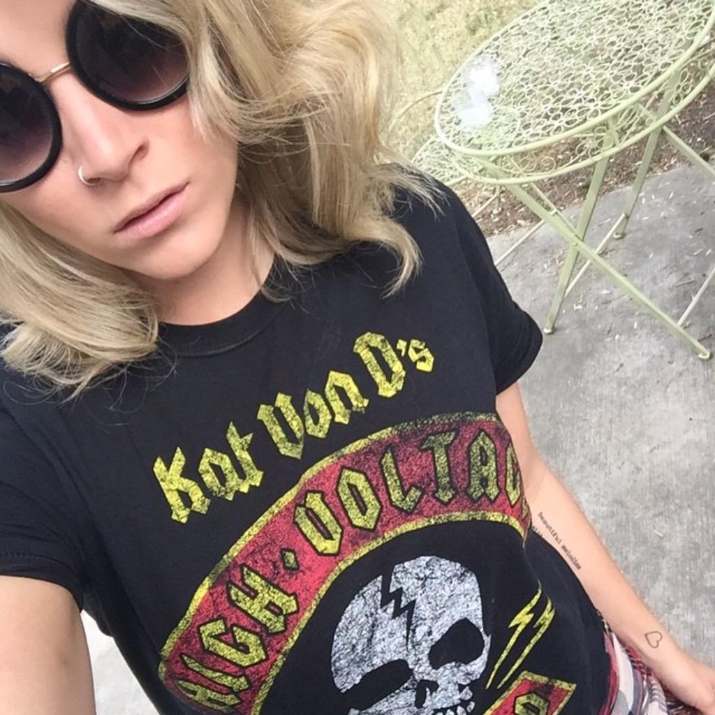 Look how hot <a href="/NRTFashions/">NRT</a> looks in our classic t-shirt! This shirt is available at highvoltagetattoo.com or in shop