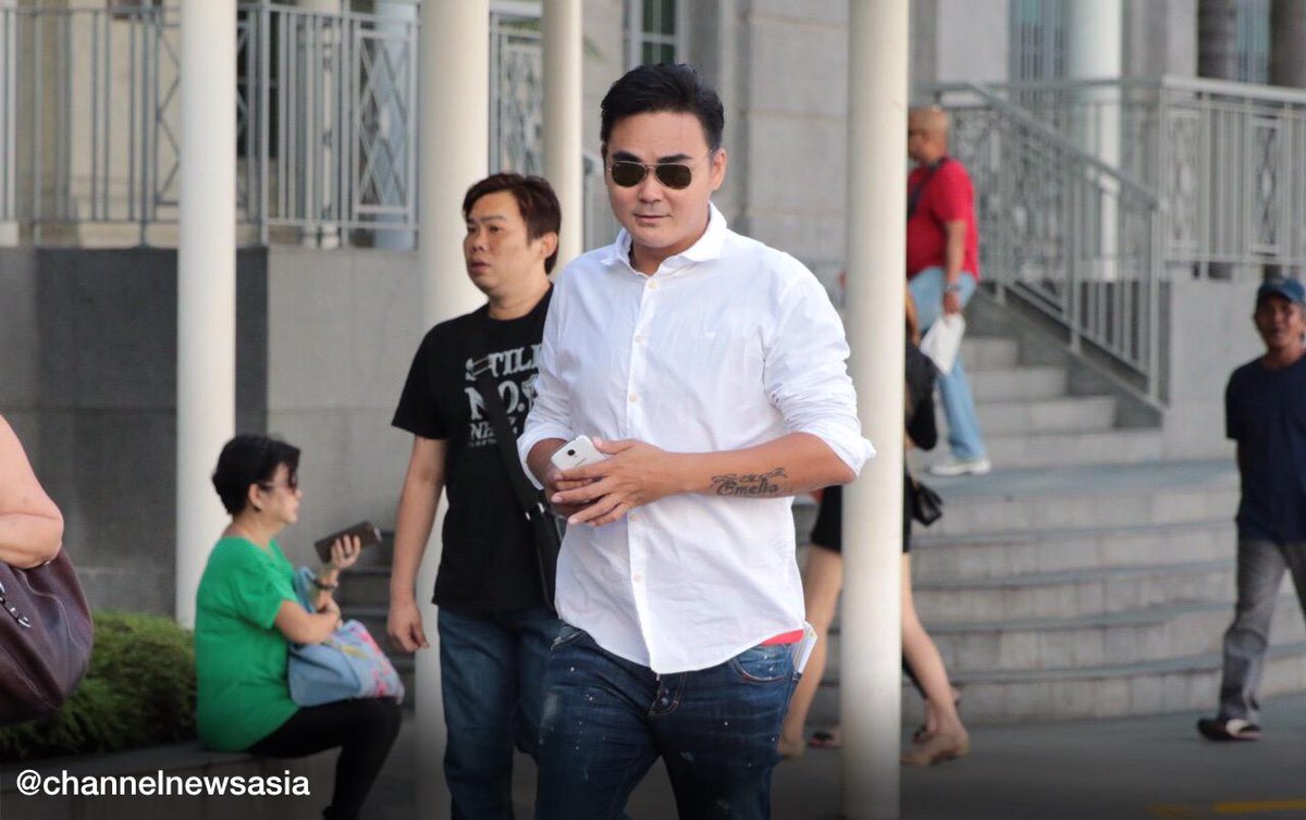 ChannelNewsAsia's tweet photo. UPDATE: Edmund Lim, the man who took over Mobile Air shop at #SimLimSquare, arrives at court http://t.co/N0qAw2DNAt http://t.co/Sforcfme2m