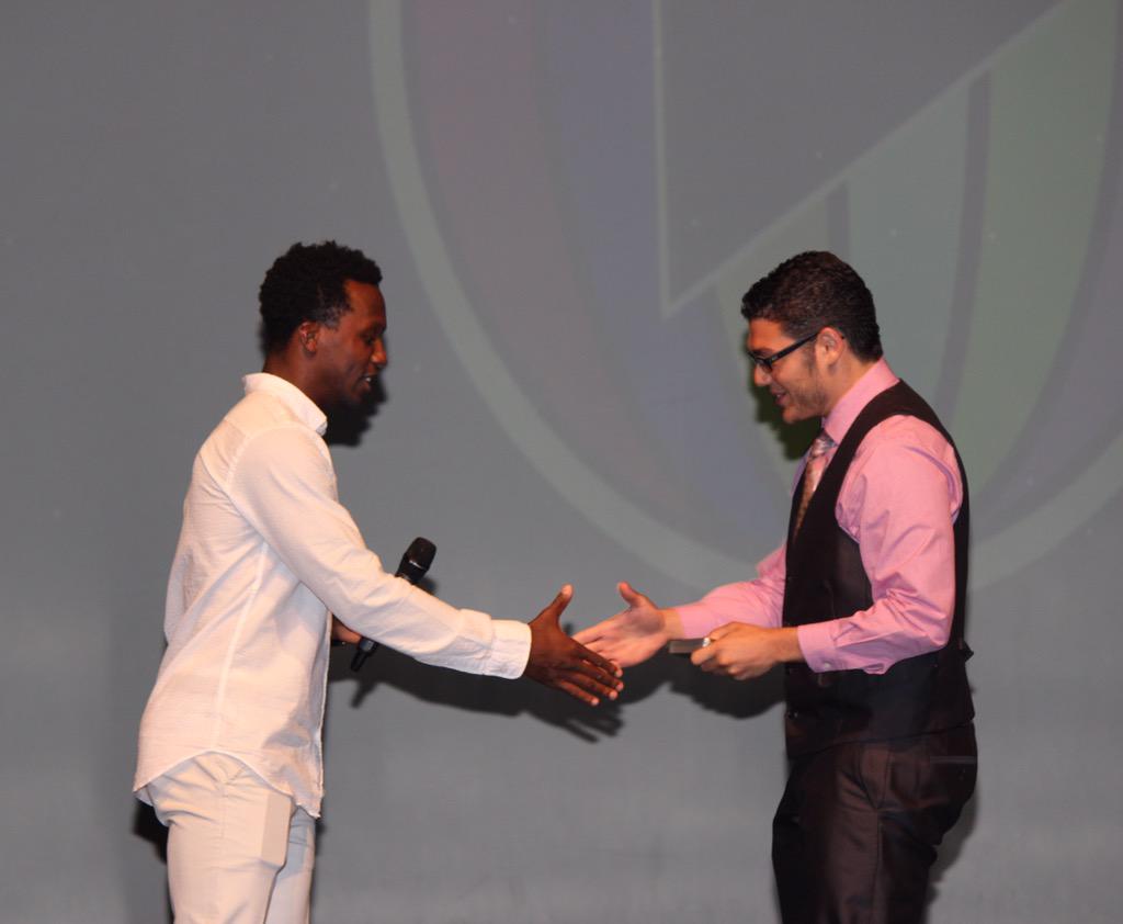 michaelcuni's tweet photo. @Emmanuelkabongo it was a pleasure to meet you tonight and receive the award from you! #PlaYRVideoAwards #PVA2015 http://t.co/uq2ITCaf13