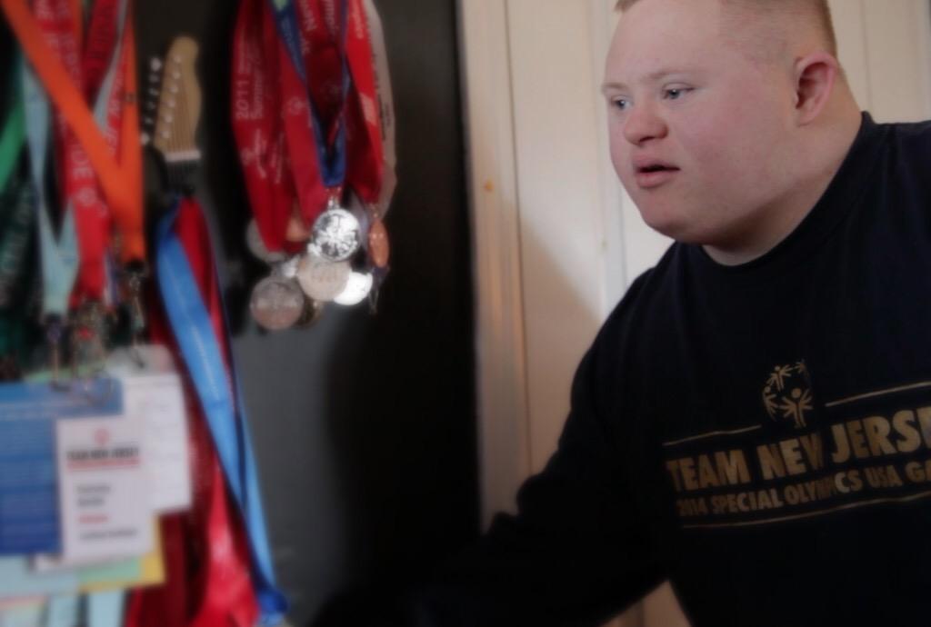 DefineChallenge's tweet photo. From a moment in the film. One starring athlete showing us his medals proudly!! http://t.co/faGckcHovD
