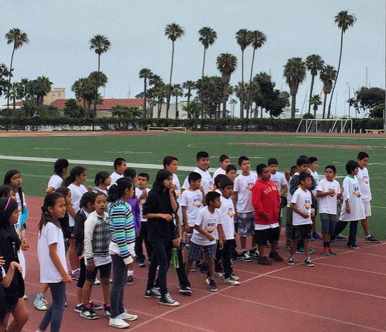 themile's tweet photo. Harding School kids know where the Mile mark is: 9 meters back! BBTM cheering Final Mile at #SBCC track. #GoMile! http://t.co/OnmbUmUMYE