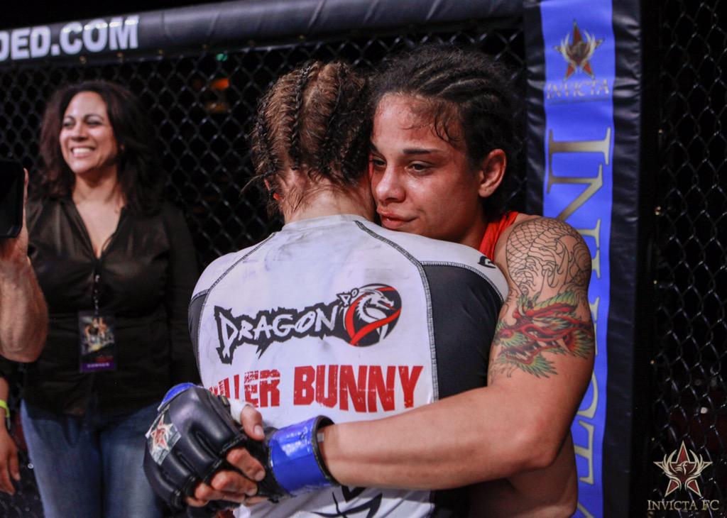 InvictaFights's tweet photo. .@livinhamma embraces Kankaanpää after claiming the Strawweight title at #InvictaFC12 http://t.co/1jx7lSH8iT