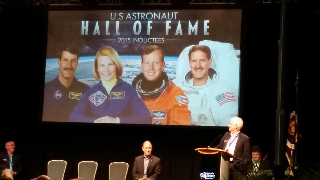 AstroGingerSnap's tweet photo. One #hubblehugger introducing another into the #AHOF. @SciAstro was the last person to touch Hubble. http://t.co/PRMOcjfAar
