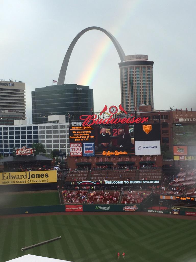 Cardinals's tweet photo. Rainbow forming out of the Gateway Arch during the rain delay in St. Louis. http://t.co/uiFJcPPOY8