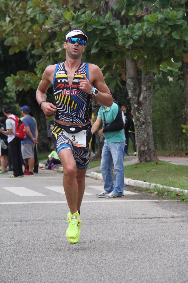 IRONMANLive's tweet photo. #IMBrasil @TOinTRI running strong in second http://t.co/6h9I7jKyxO