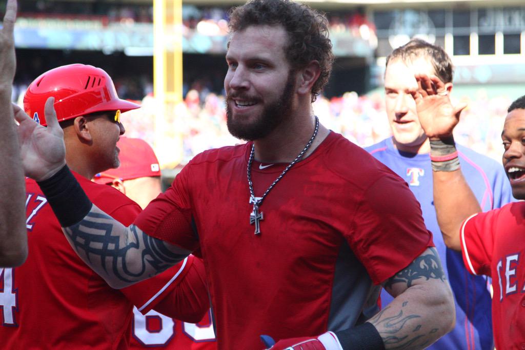 Rangers's tweet photo. High-five walk-off! http://t.co/oYa7APsRRX