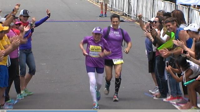 wsoctv's tweet photo. Watch 92-year-old from Charlotte cross finish line at San Diego marathon: http://t.co/eumOzxKhwG http://t.co/oQCwCokNcT