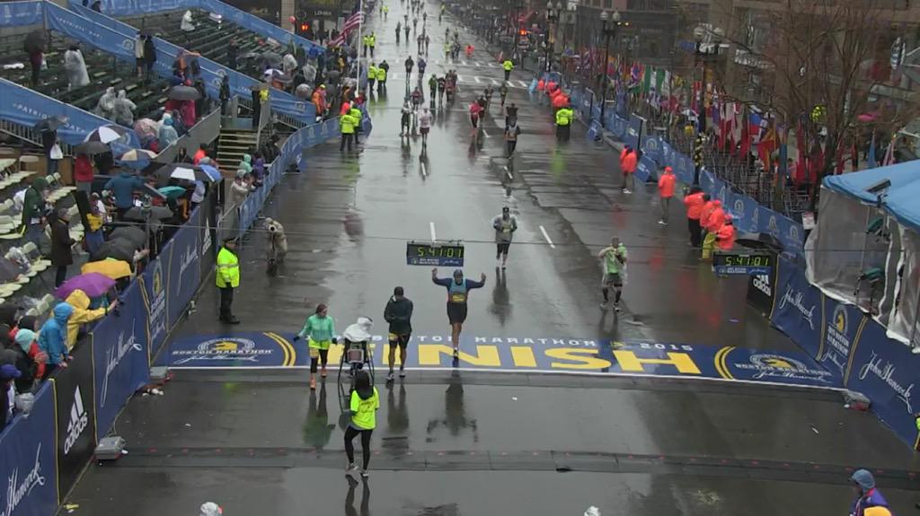 Crossing the Boston marathon finish line , I am exactly running on the N just under the clock :)