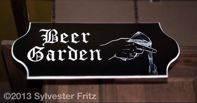 fritzorama's tweet photo. Beer Garden that way ππΌ.. oh sorry about the shoes, were they swade? #signwriting #oldenglishscript #fineart http://t.co/kxexHjUsA1
