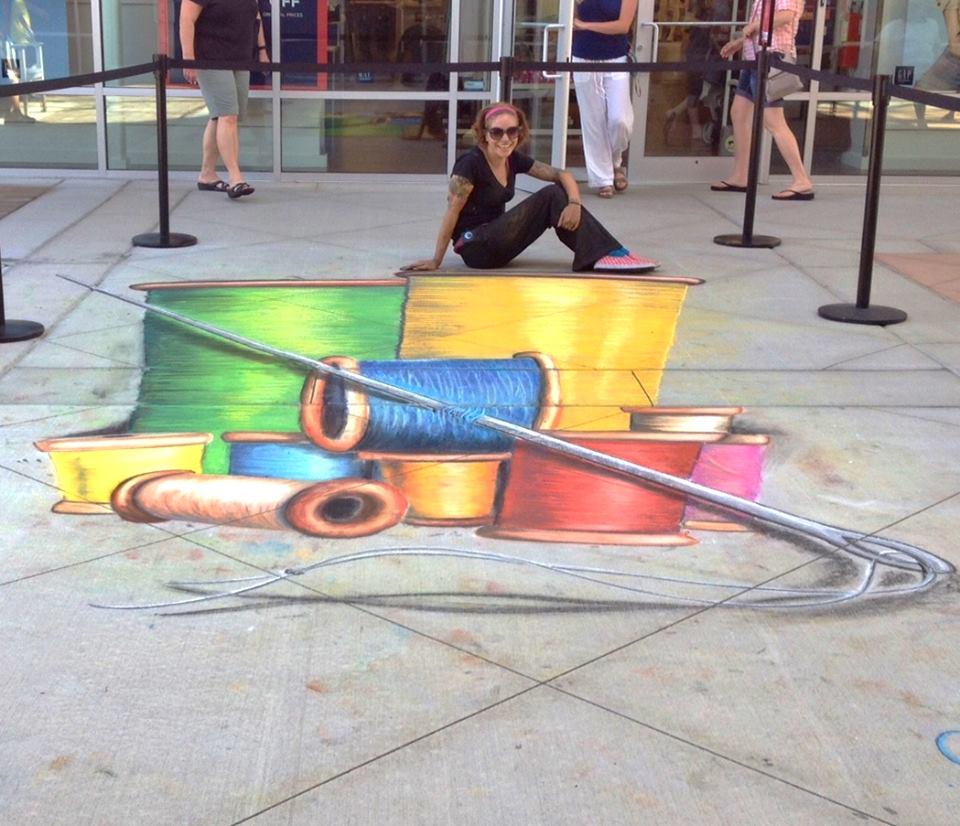 ArtStLouis's tweet photo. Sew cool! @chalkriot's #3D #chalk #art @ Taubman Prestige Outlets last Sat. #shoptothebeat http://t.co/1yvPTYU2xK http://t.co/ayxFUm8Ale