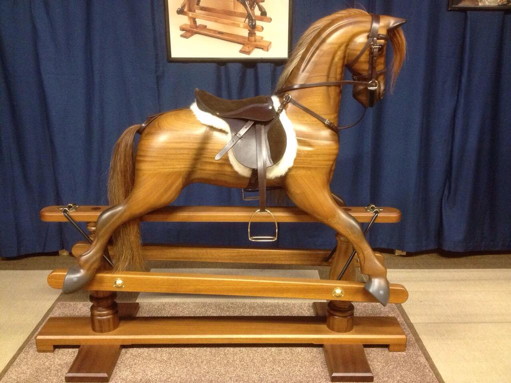 A stunning polished walnut #rockinghorse from #horsecraft . #horse #horses #woodentoys #toys #kidstoys #luxurytoys