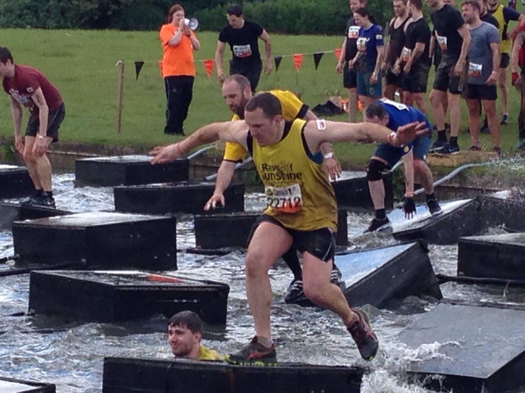 JSTLTD's tweet photo. Our Director @KewJason completing another @ToughMudder with the @99pStoresUK team for the #RaysofSunshine charity http://t.co/mmKSJwHLRC