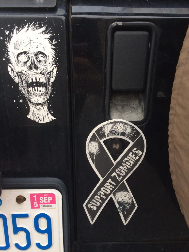 reedusxarmy's tweet photo. Found these awesome car stickers today on someone's vehicle 😎😱💀👣 #TWD #SupportZombies @wwwbigbaldhead http://t.co/QYBU4EETjq