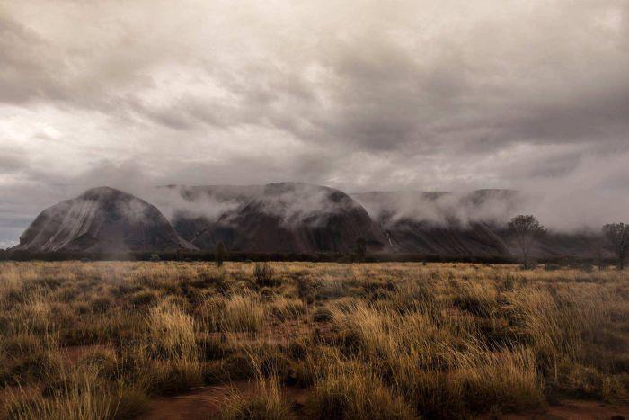 abcnews's tweet image. ICYMI: Rare sight of rain on #Uluru bit.ly/1BF889R #Storify