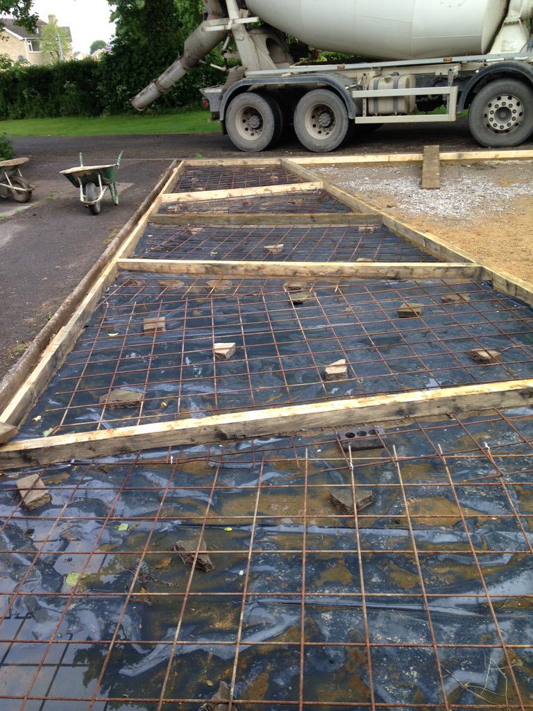 GQgardens's tweet photo. Cast concrete driveway has progressed! First half of the concrete is in! Second half of framework continues tomorrow! http://t.co/CeqCs0cizw