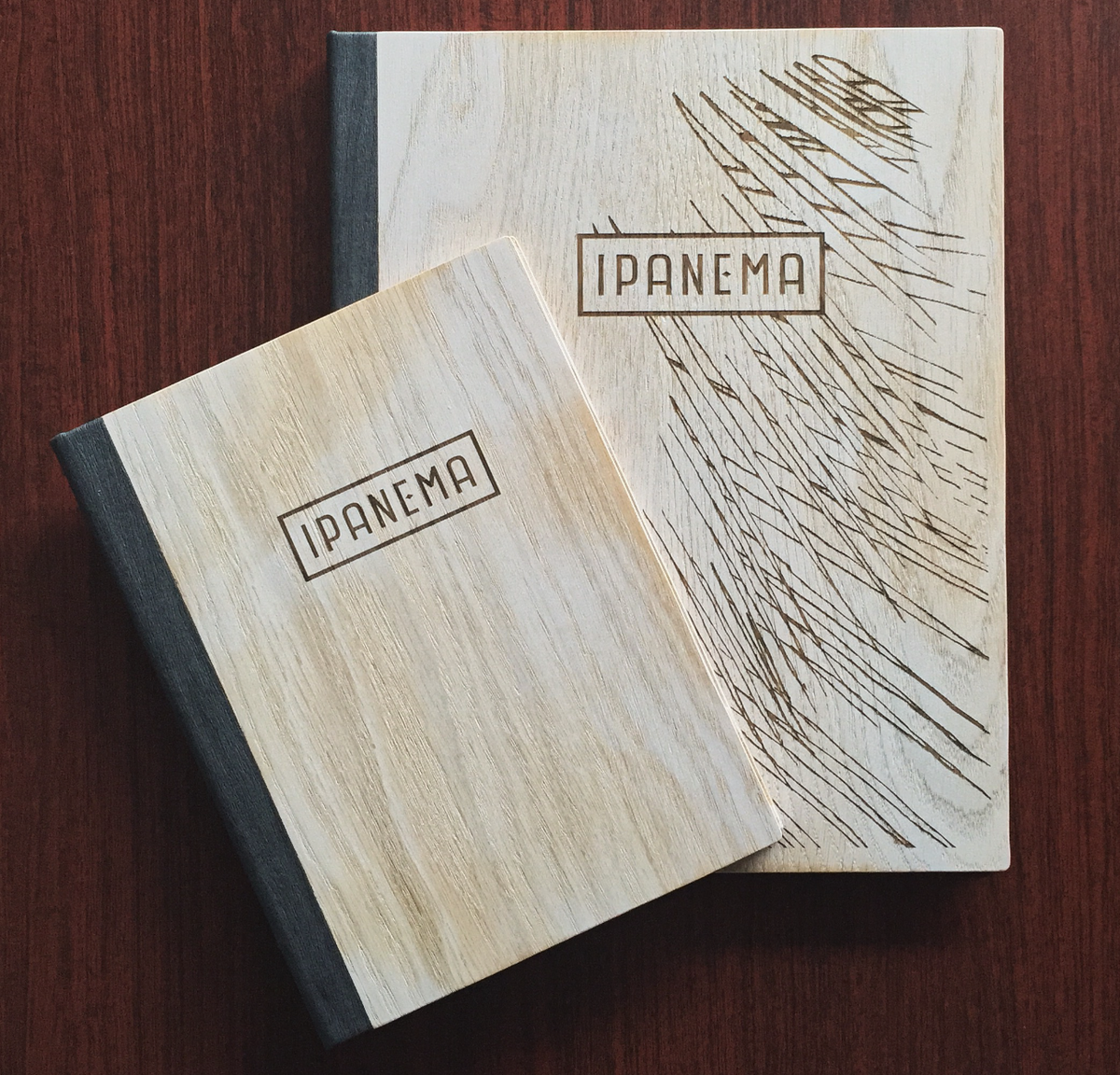 ipanemanyc's tweet photo. YASSS 🙌 - new wood menu covers have arrived at last! #ipanemanyc #menudesign #menucovers #woodmenu #menus #eatingnyc http://t.co/MCVVHuSRyF