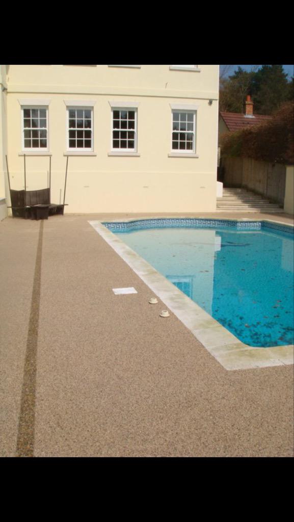 resinlayer's tweet image. Resin bound pool surrounds