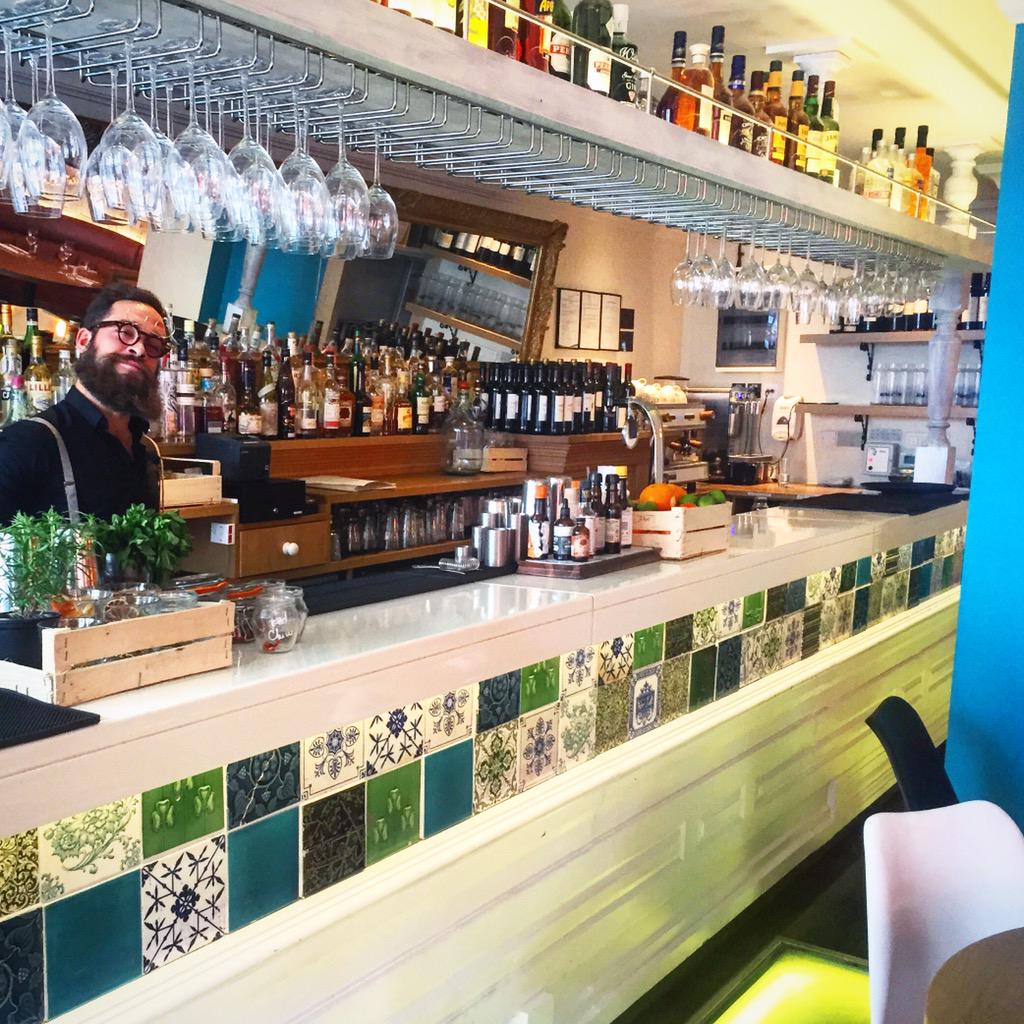Mattia behind our #beautiful #natural #lava bar top, #reclaimed tiles #salvaged #Victorian skirting #eco #kingscross